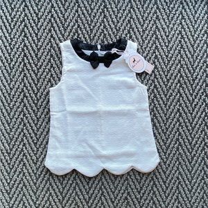 Little girls white, scalloped, collared shirt